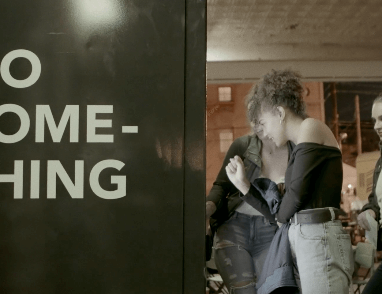 Woman interacting with the Do Something Machine