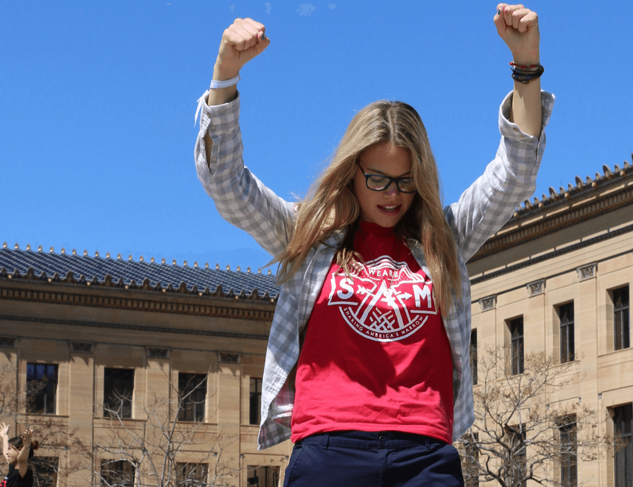 Sharing America's Marrow girl with fists in air