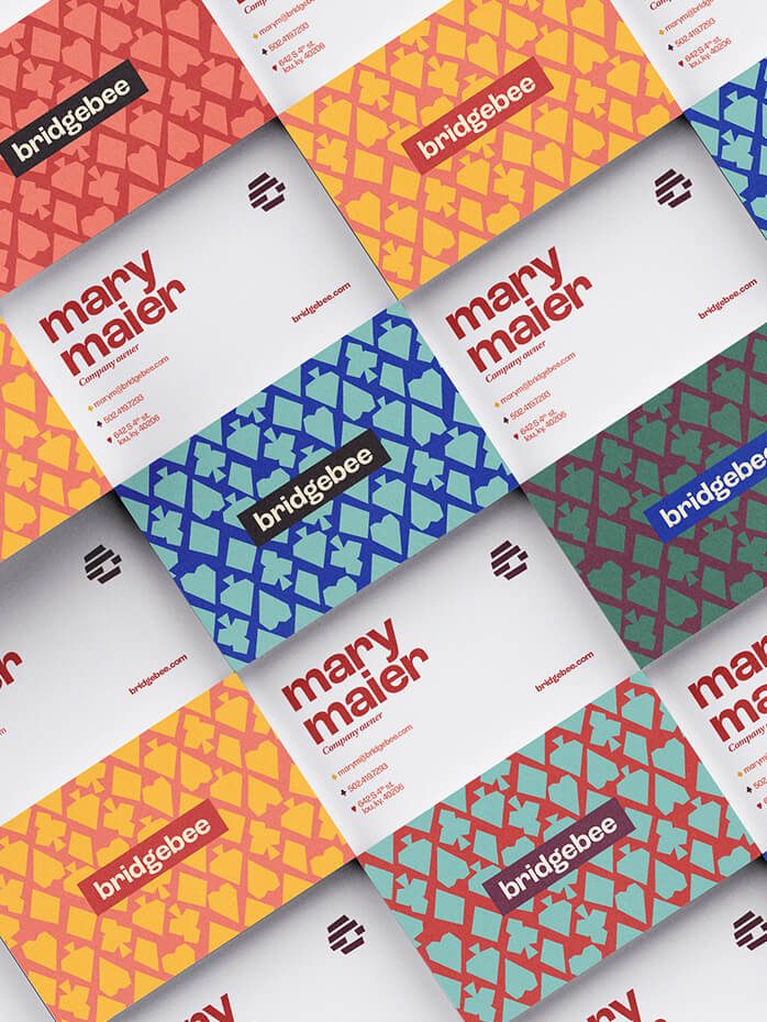 A grid of colorful business cards for bridgebee and Mary Maler, featuring vibrant geometric patterns on one side and contact details on the other. The designs use yellow, blue, red, and green color schemes.