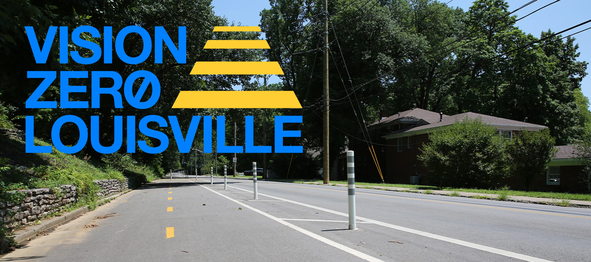 A protected bike lane runs beside a residential street lined with trees. Large blue text reads VISION ZERO LOUISVILLE next to yellow painted lines resembling a crosswalk.