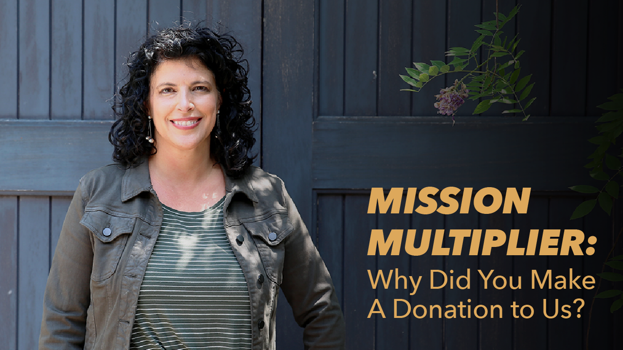 A woman with curly dark hair stands smiling in front of dark wooden doors. Beside her, text reads: MISSION MULTIPLIER: Why Did You Make A Donation to Us?.