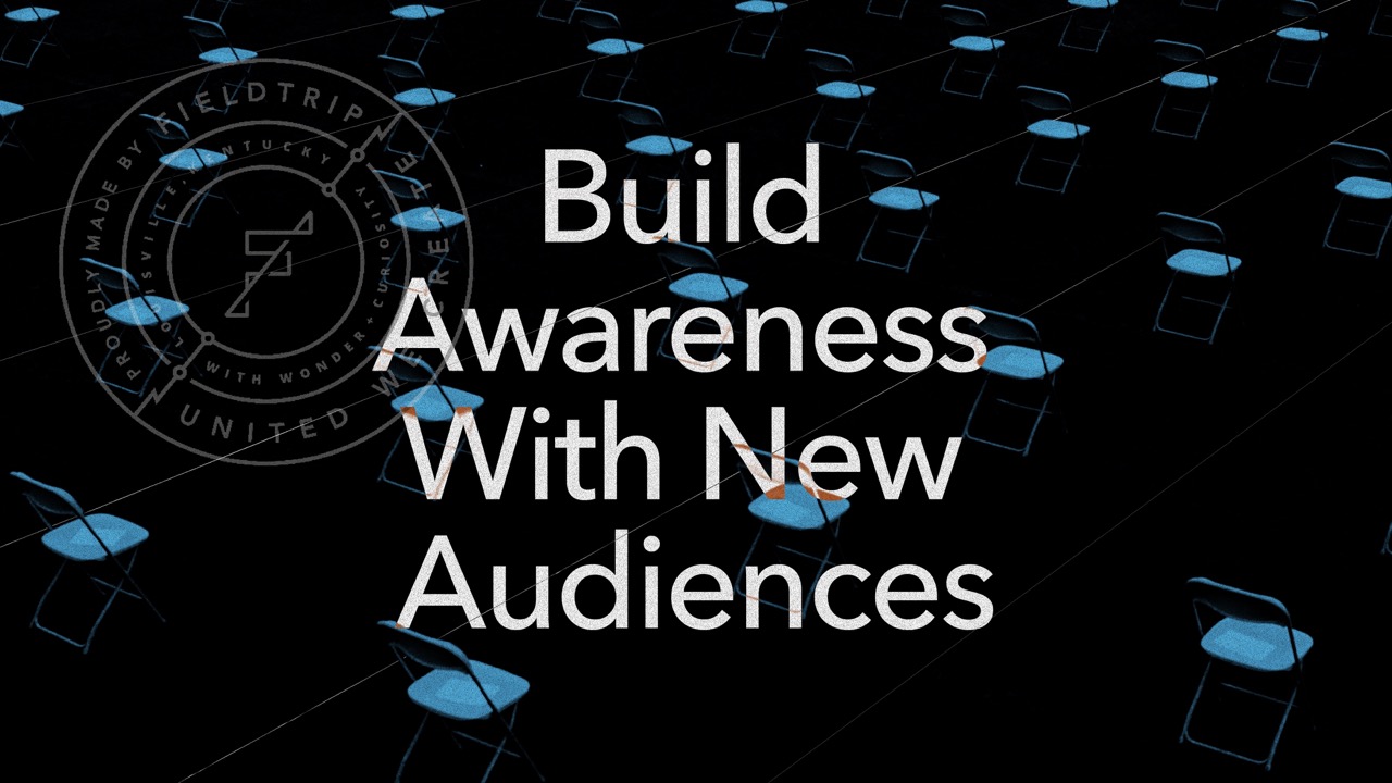 Rows of blue chairs are arranged on a dark background. Overlaid white text reads, “Build Awareness With New Audiences.” A circular watermark is visible on the left side of the image.