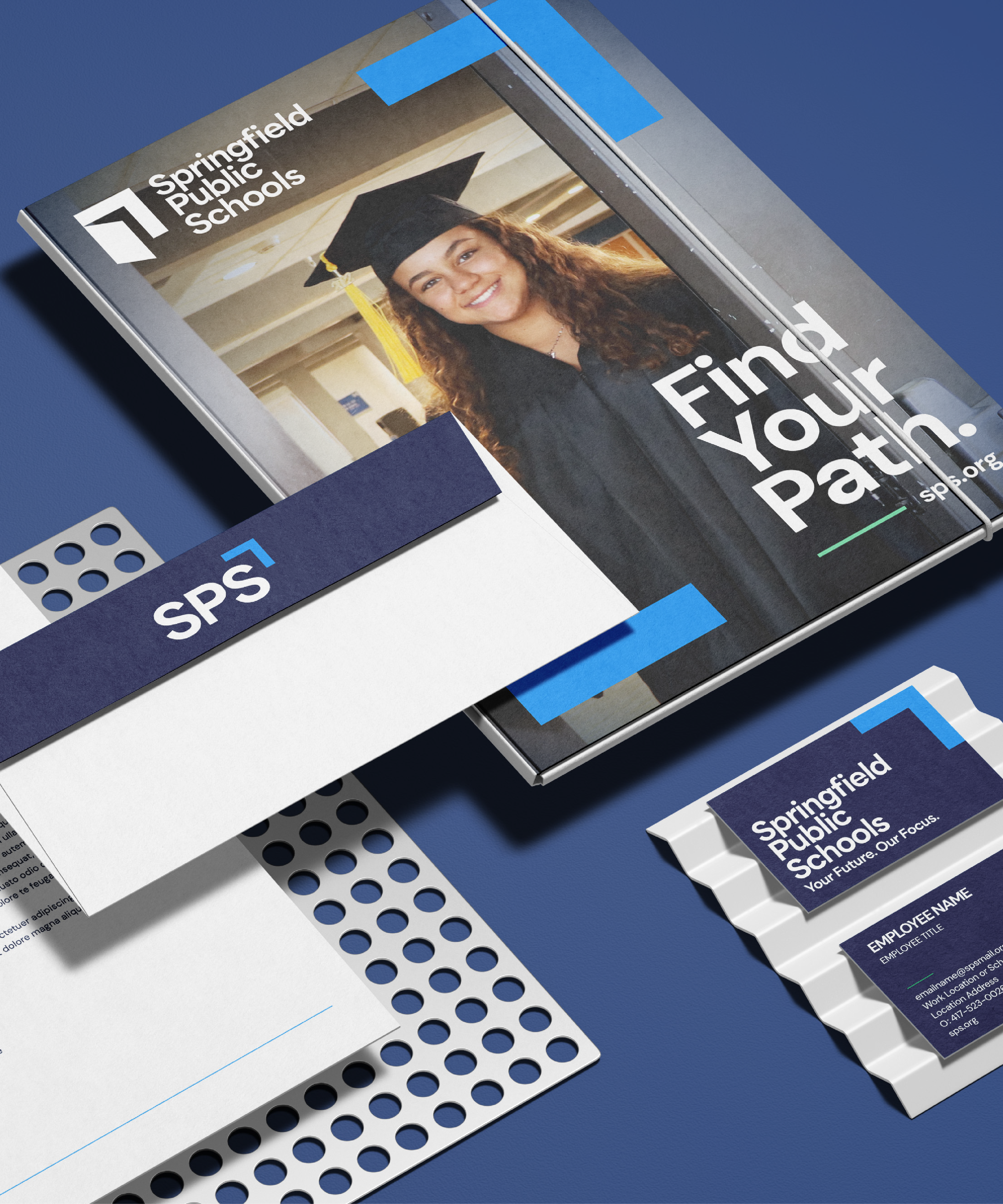 A brochure, letter, envelope, and business card display Springfield Public Schools branding. The brochure features a smiling graduate in a cap and gown with the text Find Your Path.